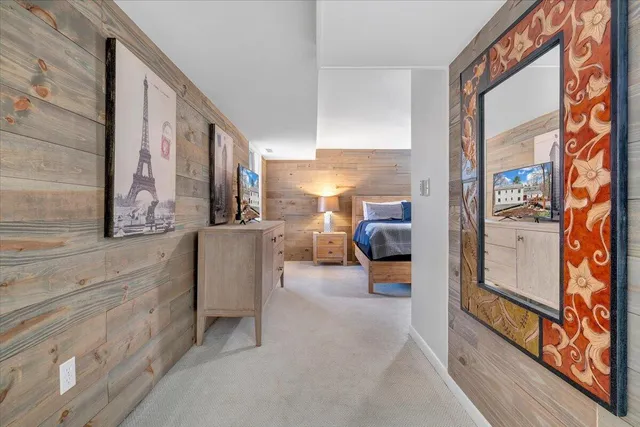 a view of an empty room with a fireplace