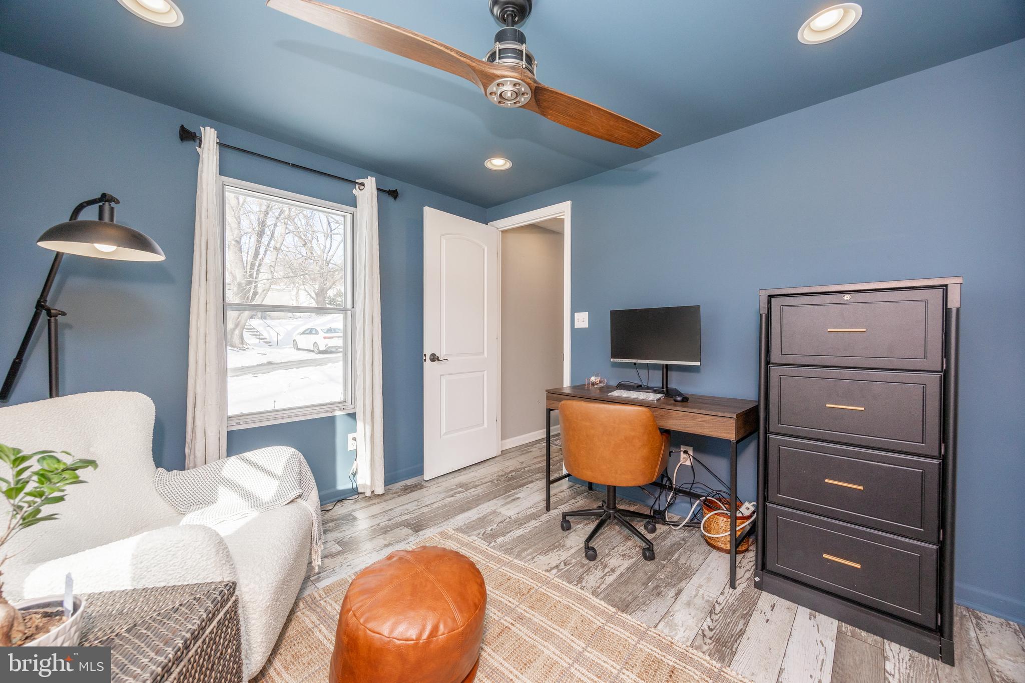 1524 Jonathan Road West Chester, PA 19380 - Photo 19 of 26 a living room with furniture and a flat screen tv