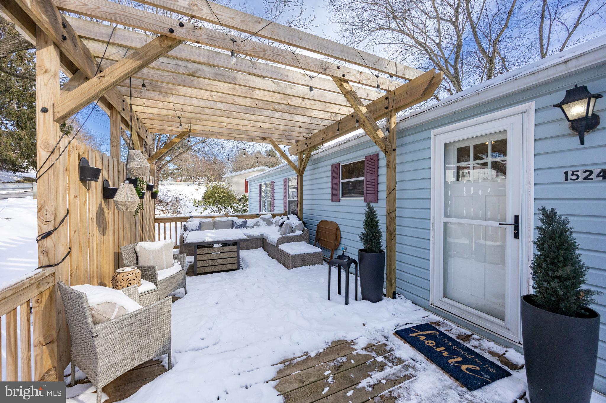 1524 Jonathan Road West Chester, PA 19380 - Photo 2 of 26 a backyard of a house with outdoor seating