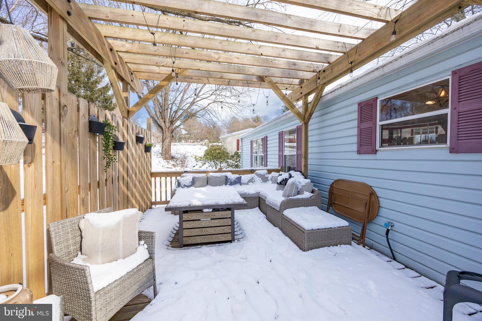 1524 Jonathan Road West Chester, PA 19380 - Photo 23 of 26 a outdoor living space with patio furniture and a potted plant