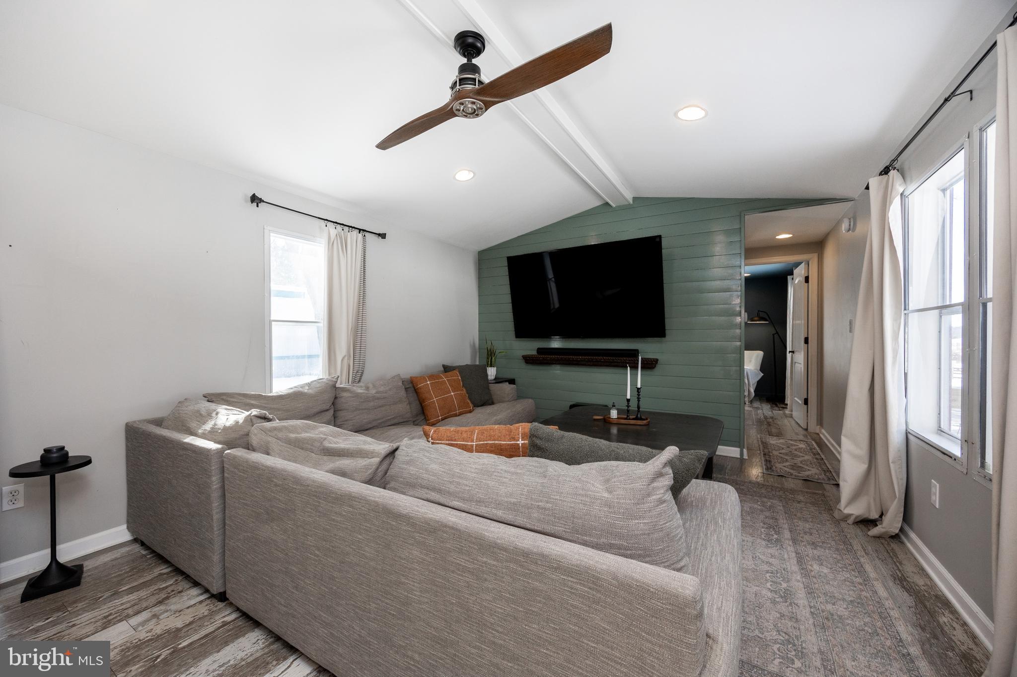 1524 Jonathan Road West Chester, PA 19380 - Photo 5 of 26 a living room with furniture and a flat screen tv