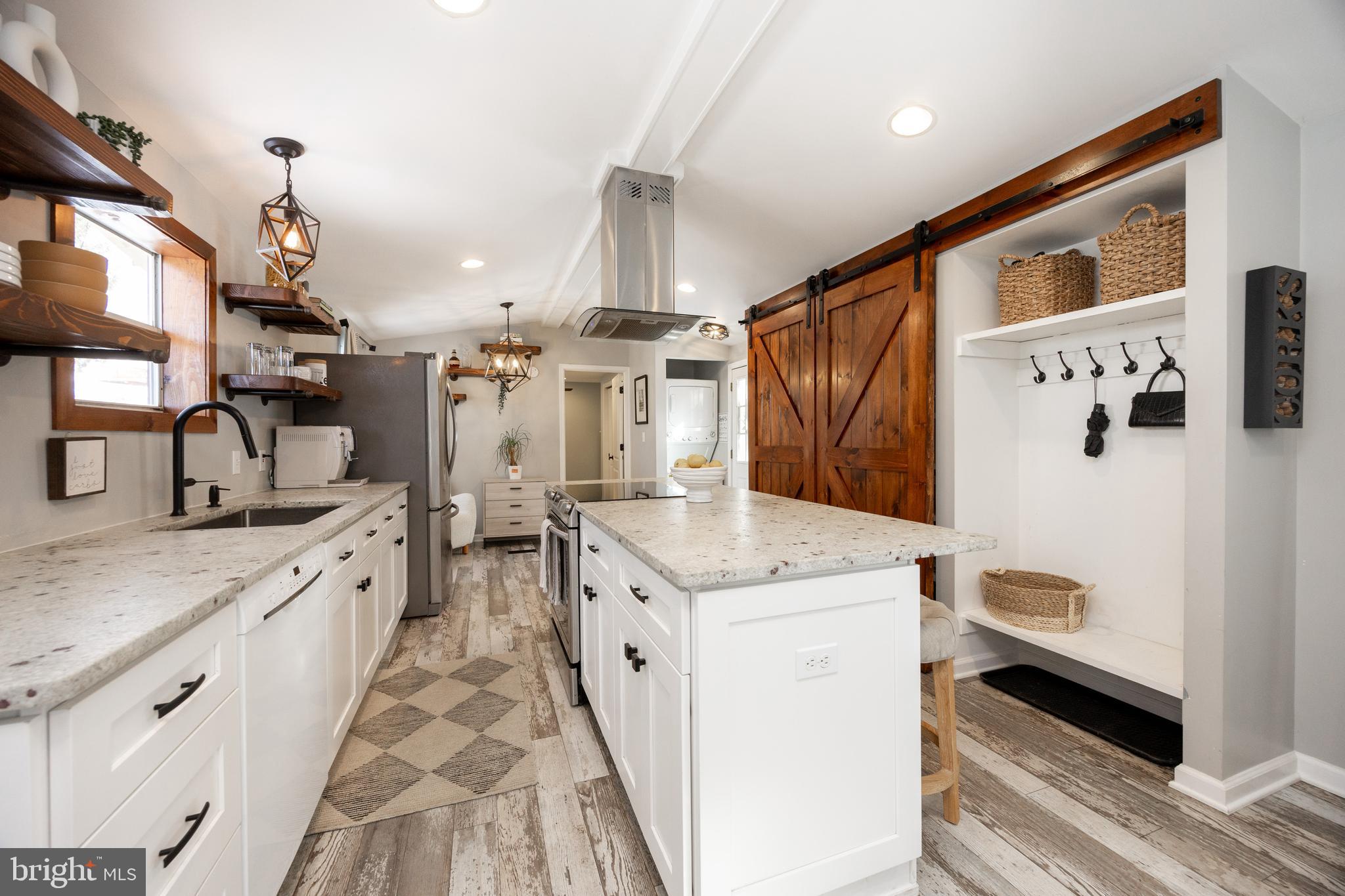1524 Jonathan Road West Chester, PA 19380 - Photo 10 of 26 a kitchen with granite countertop a sink stove and refrigerator
