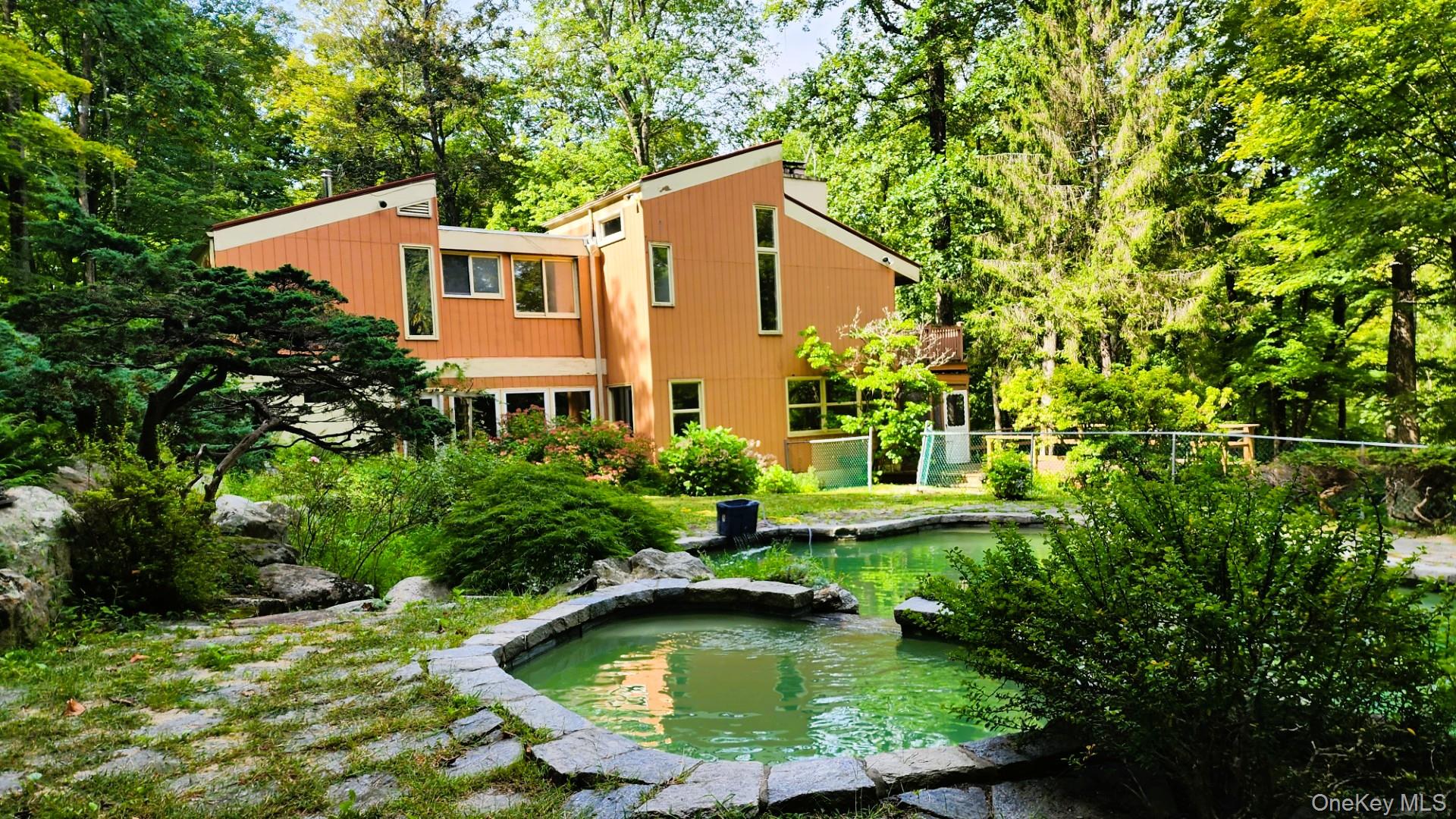 402 Hortontown Road Hopewell Junction, NY 12533 - Photo 5 of 29 a view of a house with pool