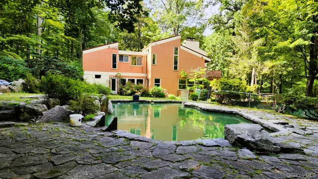 a view of a lake with a house