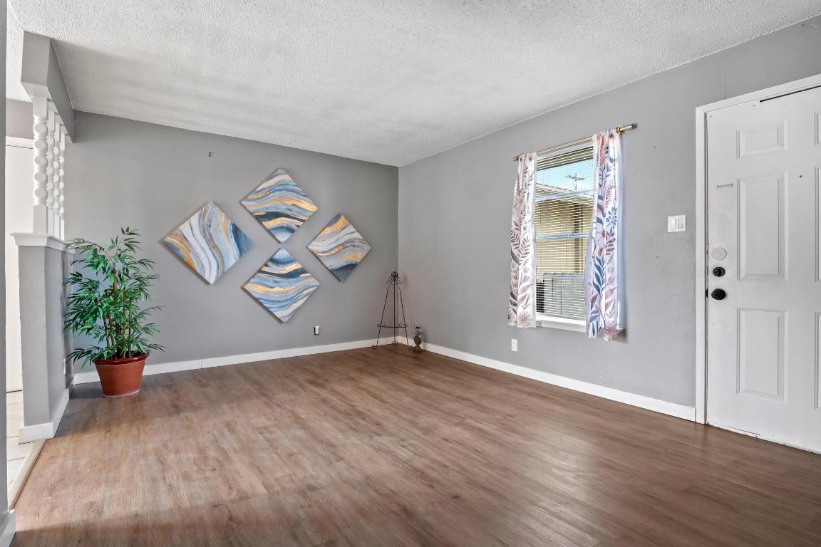 2405 Parker Circle, Unit B Georgetown, TX 78628 - Photo 17 of 23 Entrance foyer featuring wood finished floors and a textured ceiling