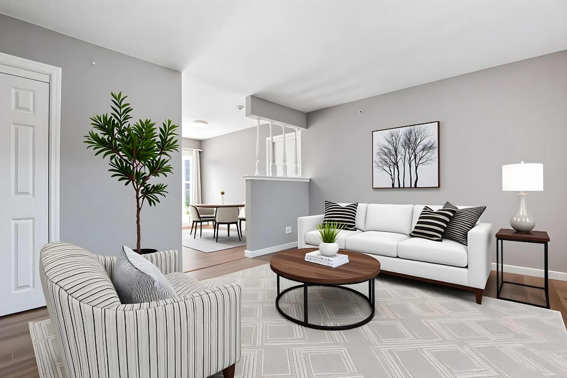2405 Parker Circle, Unit B Georgetown, TX 78628 - Photo 4 of 23 Virtually Staged- Living area with light wood-style flooring and baseboards