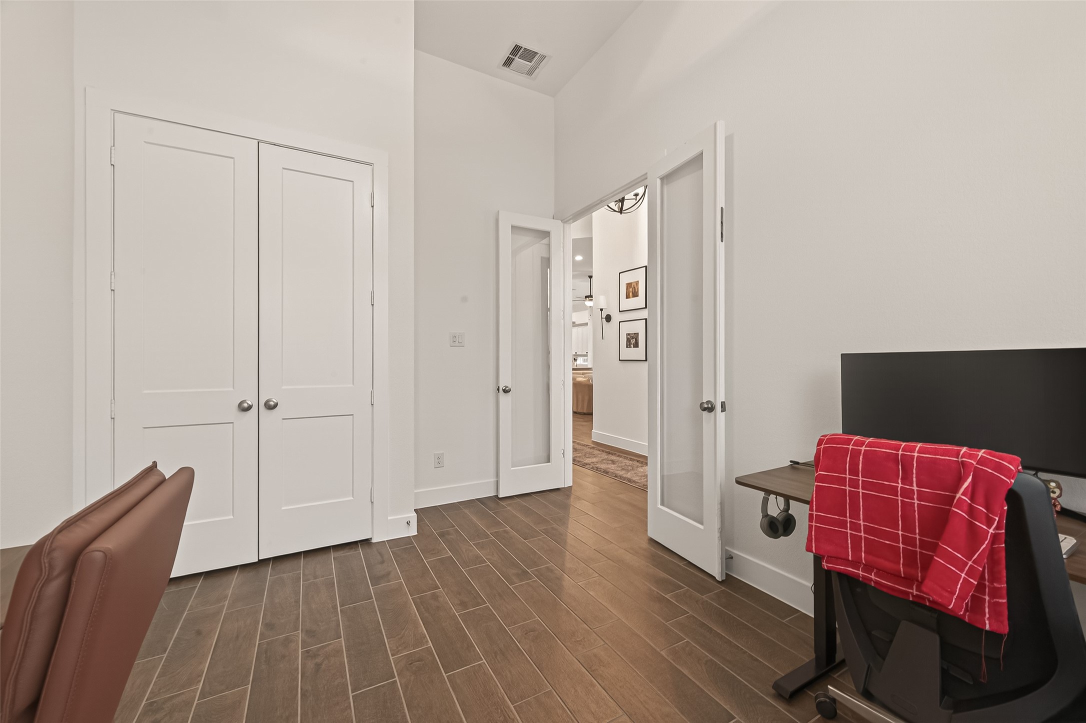 5019 Country Mdws Trail Rosharon, TX 77583 - Photo 7 of 49 a view of room with wooden floor and furniture