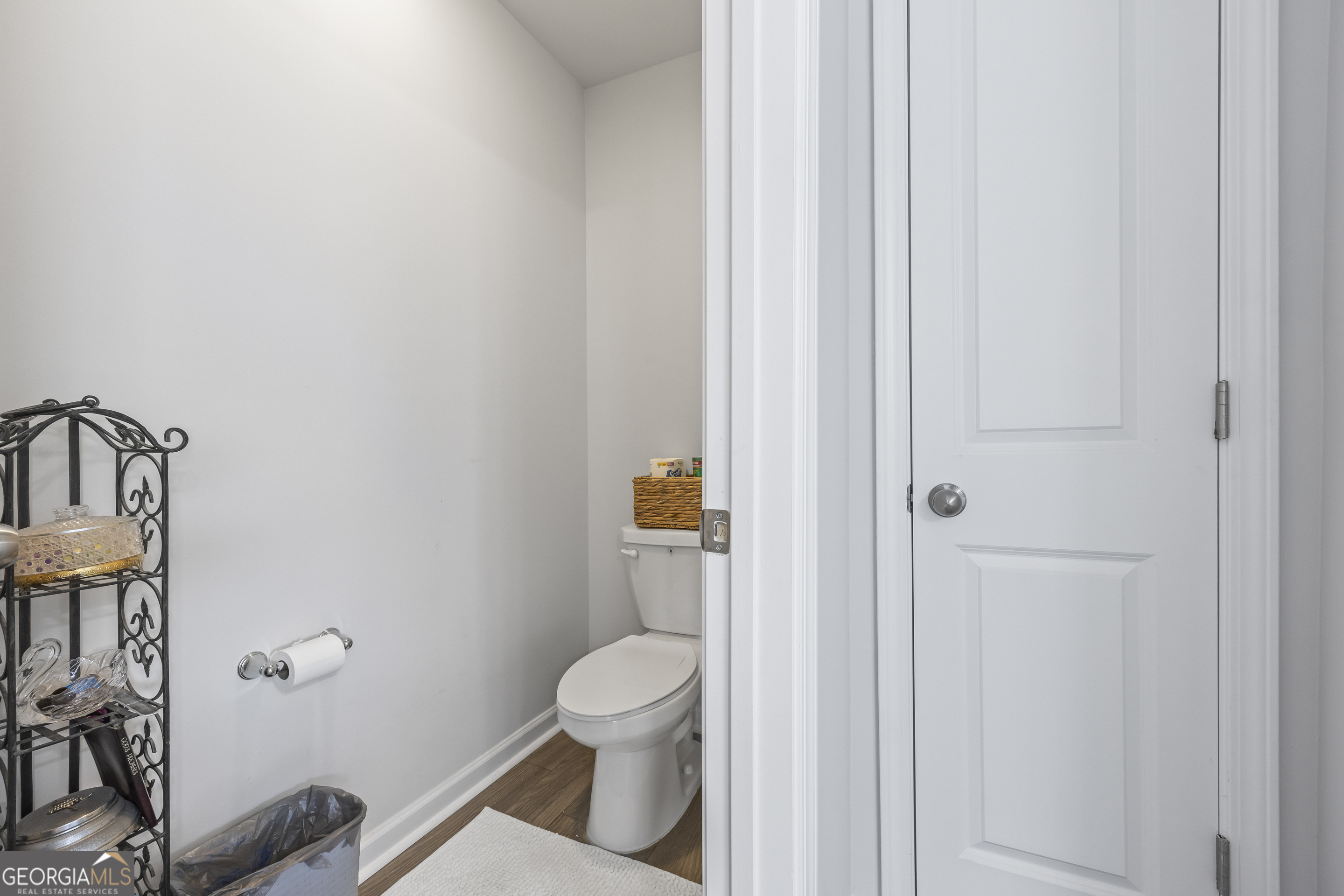 1064 Emmas Path Monroe, GA 30656 - Photo 38 of 55 a white toilet sitting next to a shower