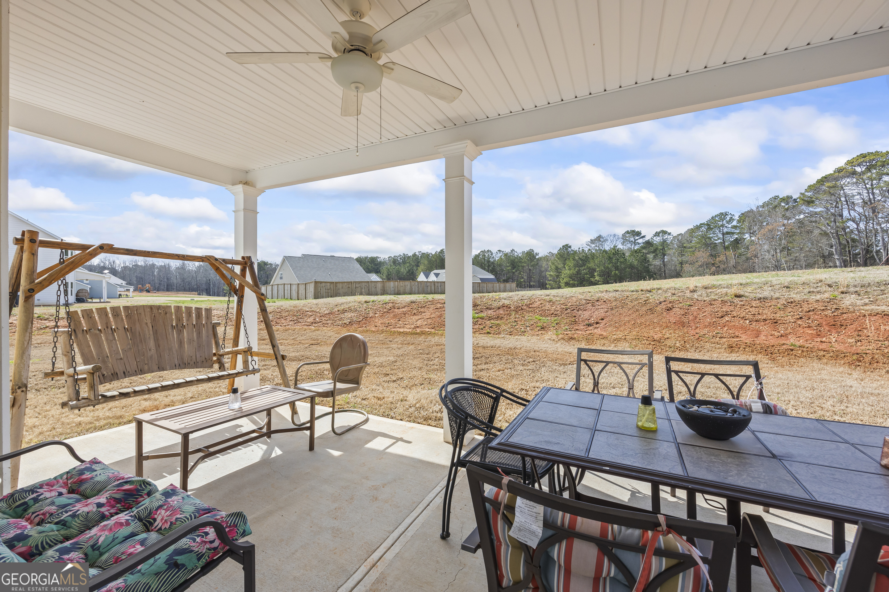 1064 Emmas Path Monroe, GA 30656 - Photo 42 of 55 a view of a outdoor seating area with furniture