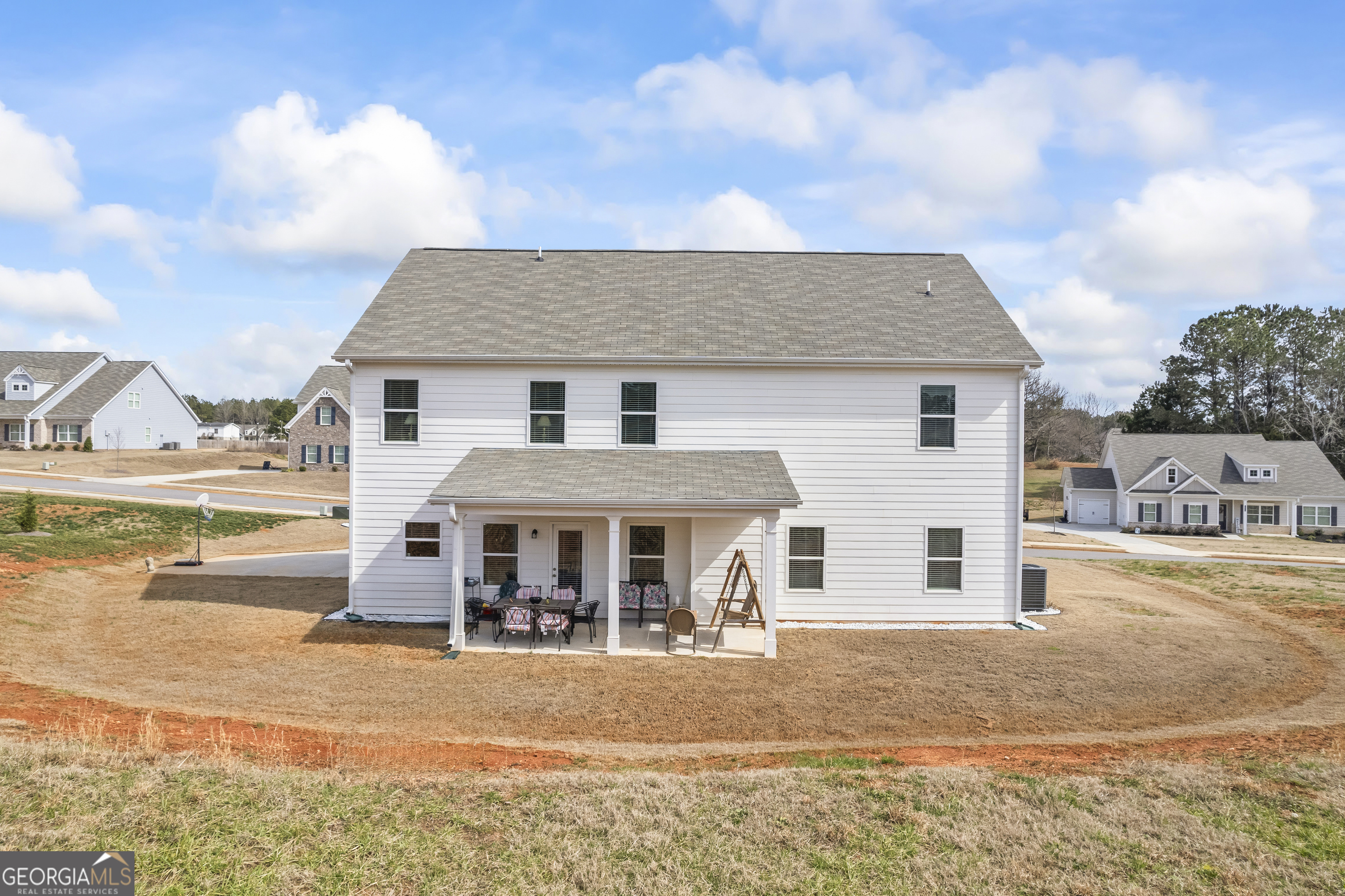 1064 Emmas Path Monroe, GA 30656 - Photo 44 of 55 a view of a house with swimming pool and sitting area