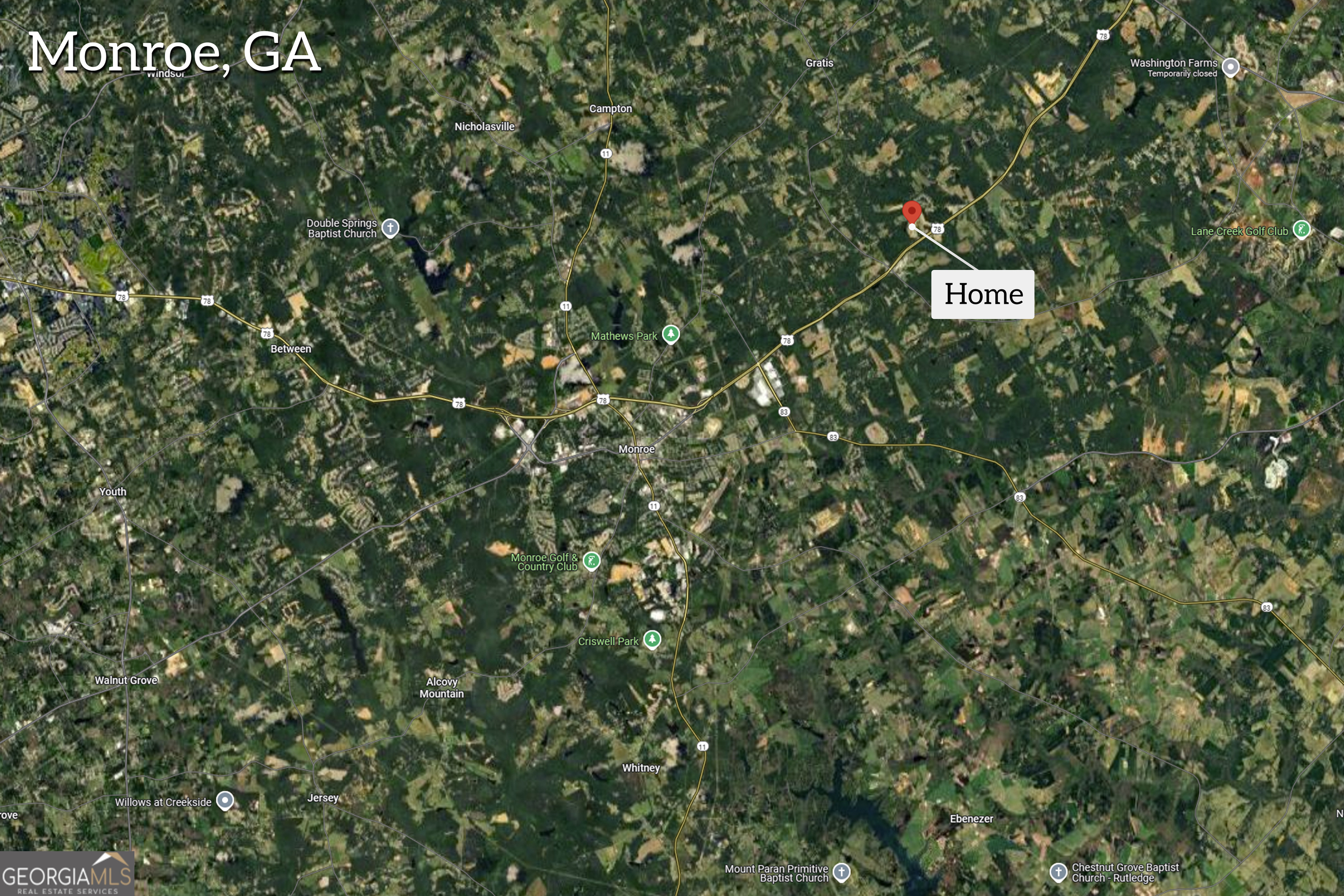 1064 Emmas Path Monroe, GA 30656 - Photo 54 of 55 a sign that is sitting in front of a tree