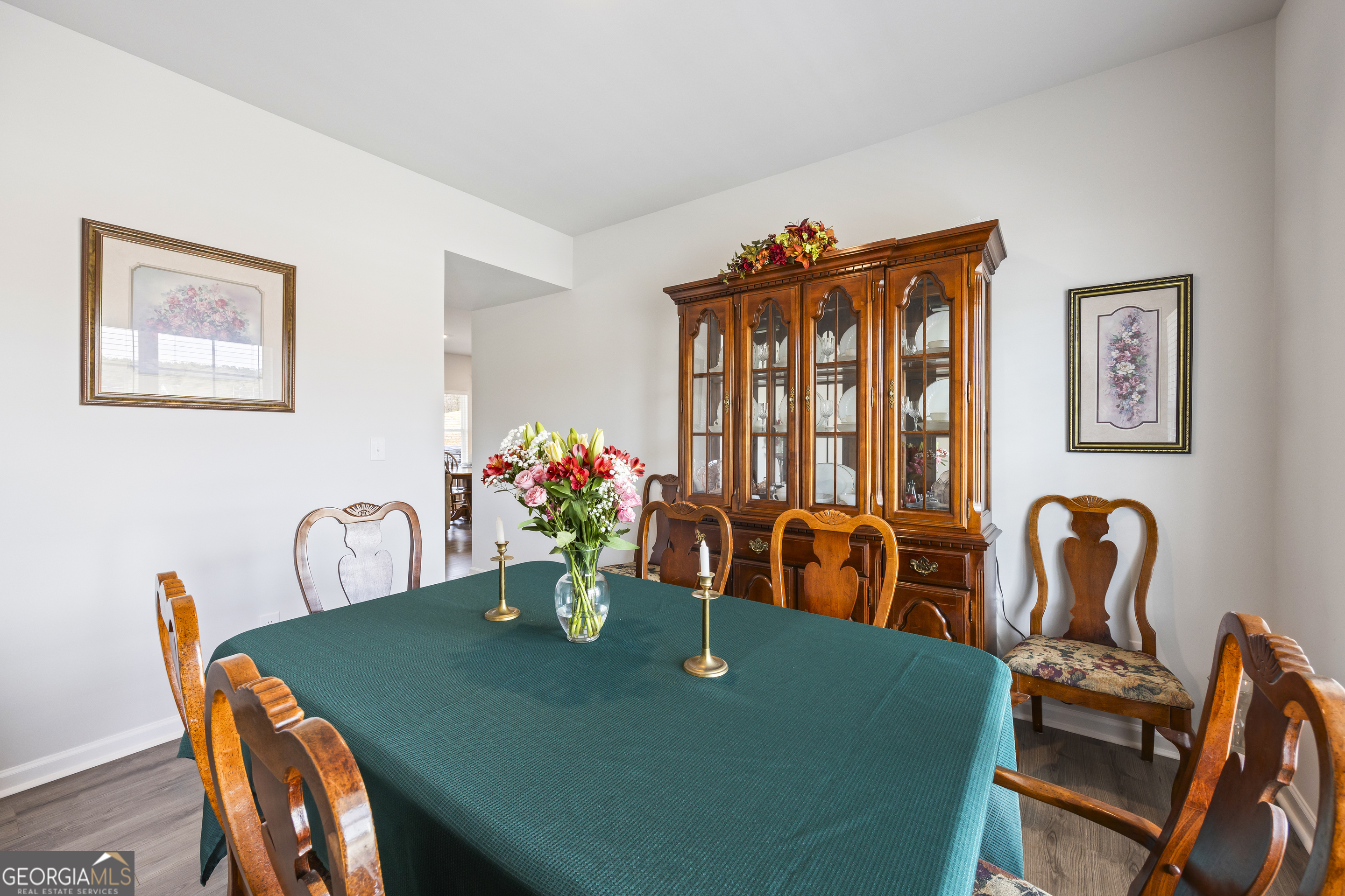 1064 Emmas Path Monroe, GA 30656 - Photo 9 of 55 a dining room with furniture and window