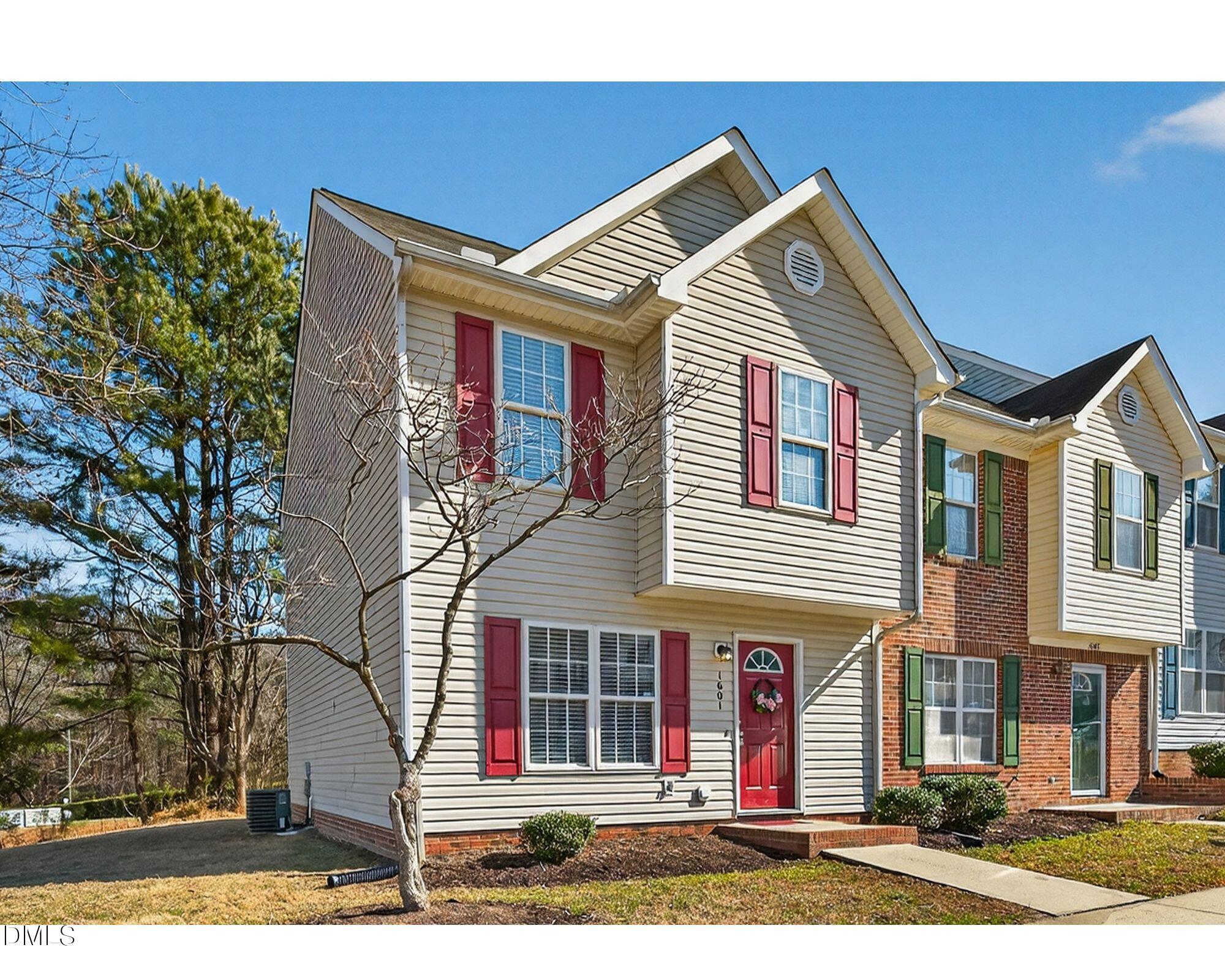 1601 Briarmont Court Raleigh, NC 27610 - Photo 2 of 30 a view of a house with a yard and large tree