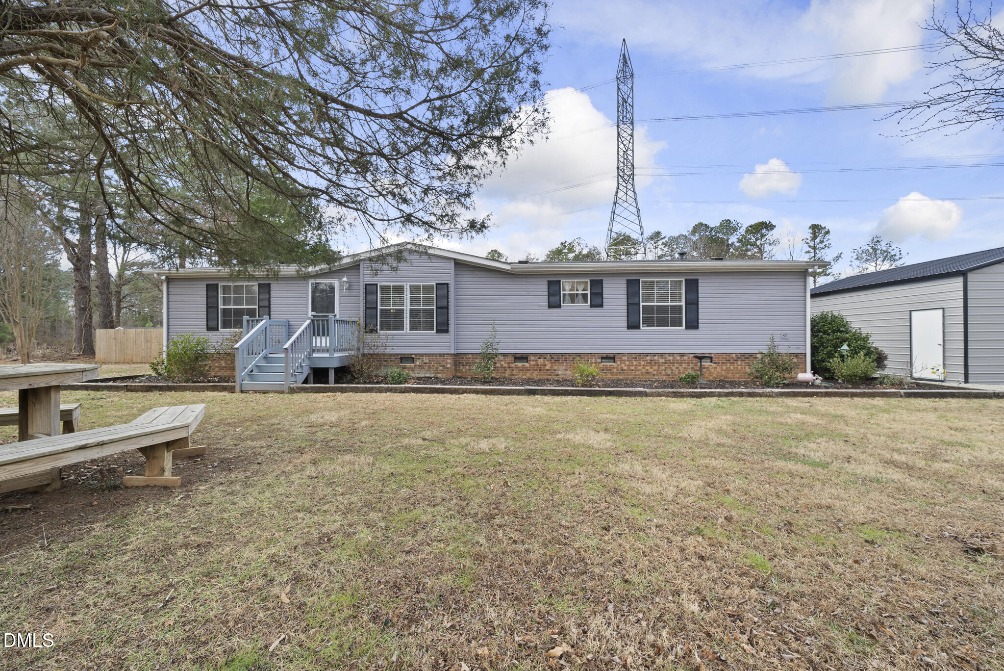 4703 Trinity Lane Rougemont, NC 27572 - Photo 1 of 55 a front view of house with yard and seating area