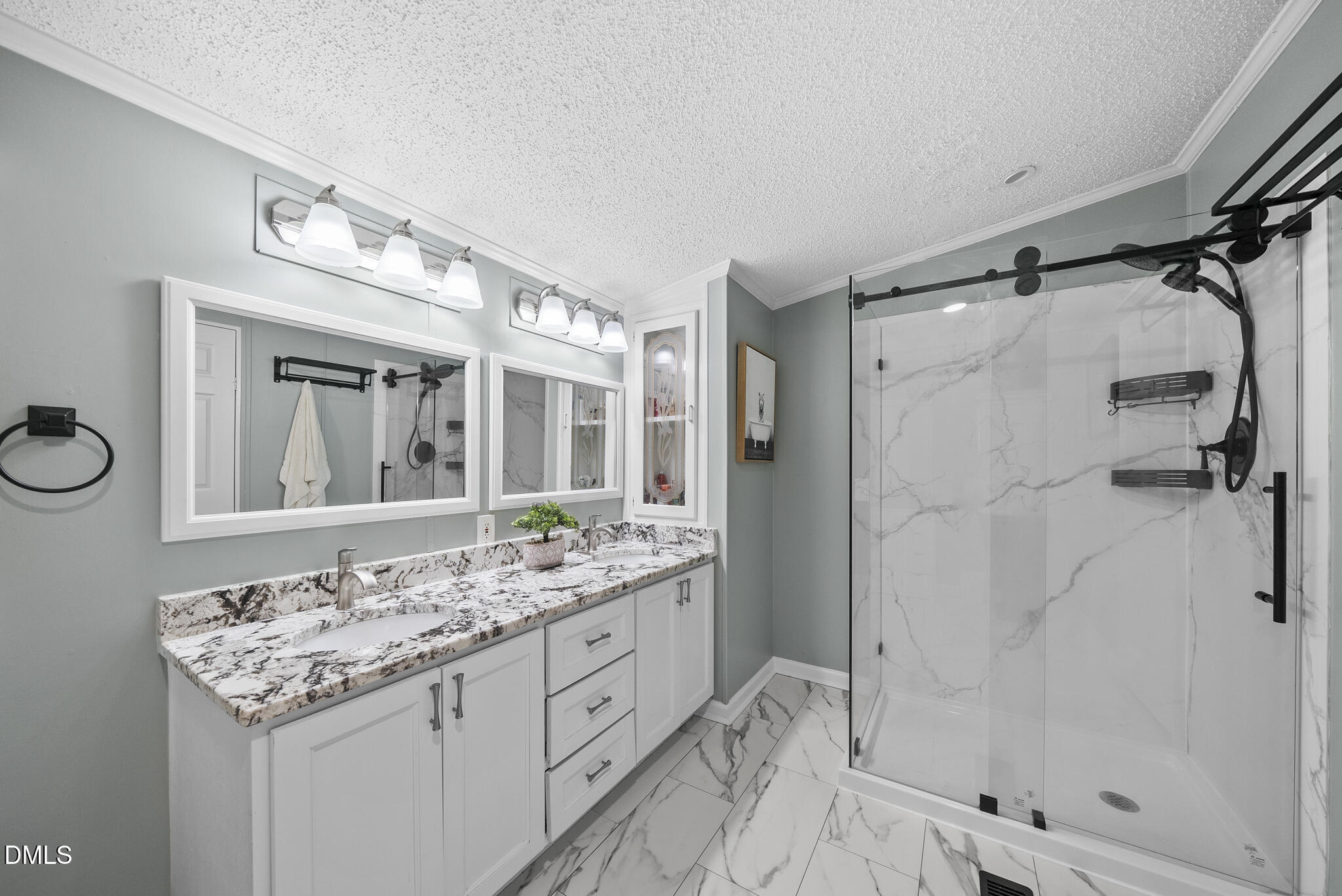 4703 Trinity Lane Rougemont, NC 27572 - Photo 16 of 55 a bathroom with a granite countertop sink mirror and shower