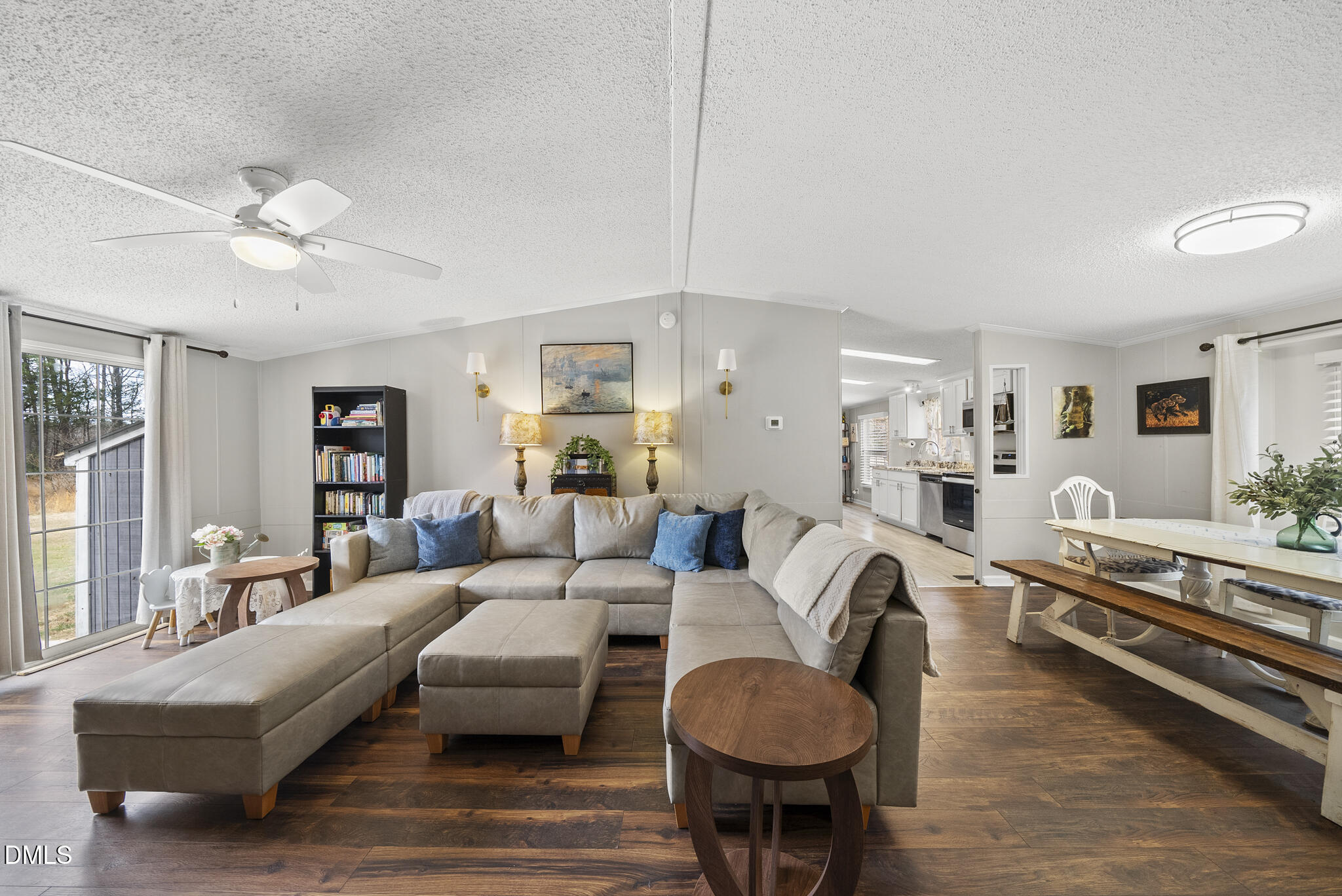 4703 Trinity Lane Rougemont, NC 27572 - Photo 18 of 55 a living room with furniture and a chandelier