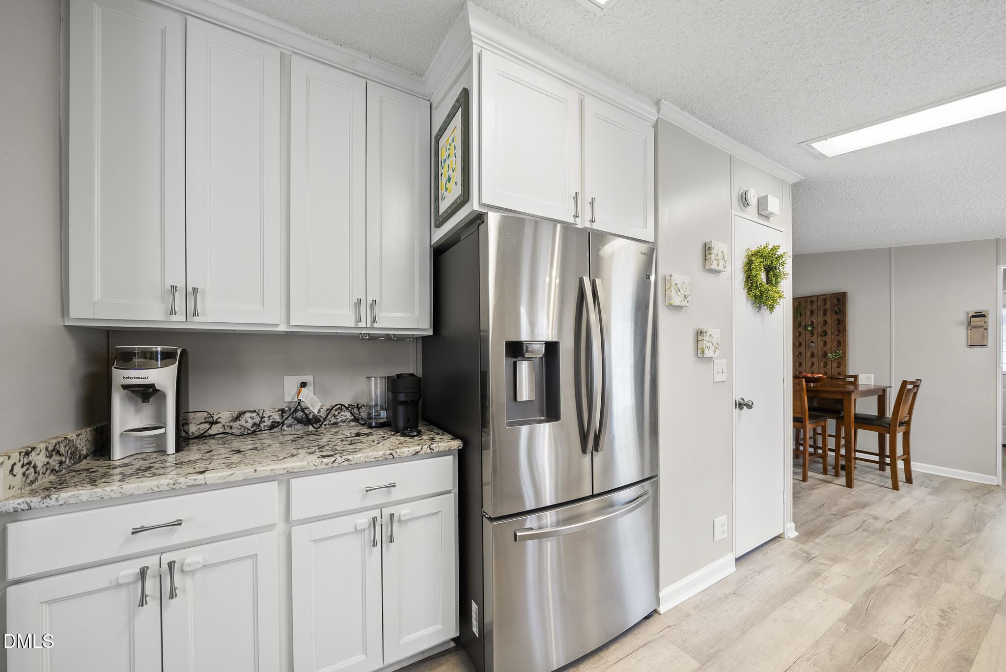 4703 Trinity Lane Rougemont, NC 27572 - Photo 21 of 55 a kitchen with stainless steel appliances granite countertop a refrigerator sink and cabinets