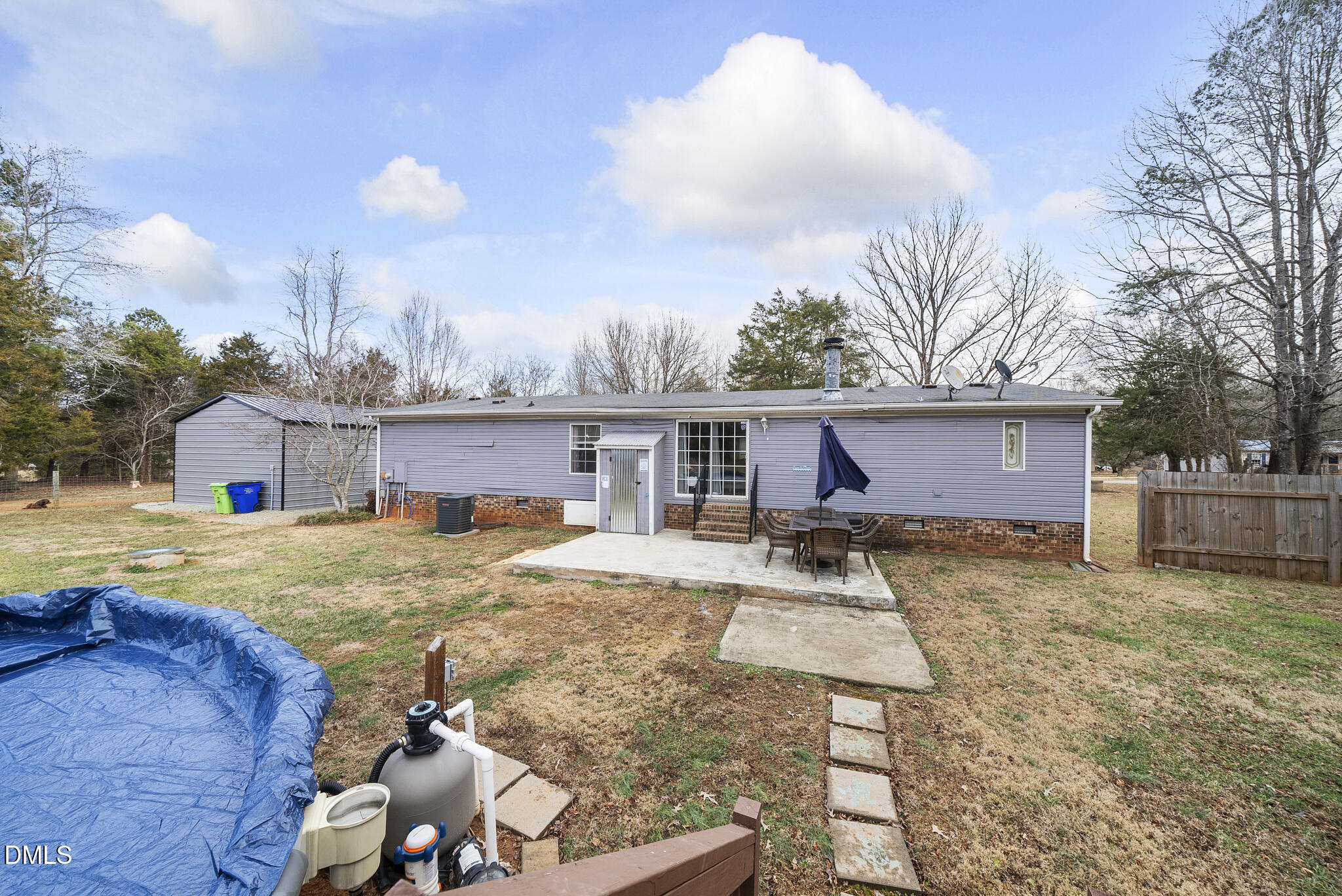 4703 Trinity Lane Rougemont, NC 27572 - Photo 42 of 55 a view of a yard with a house and a fire pit