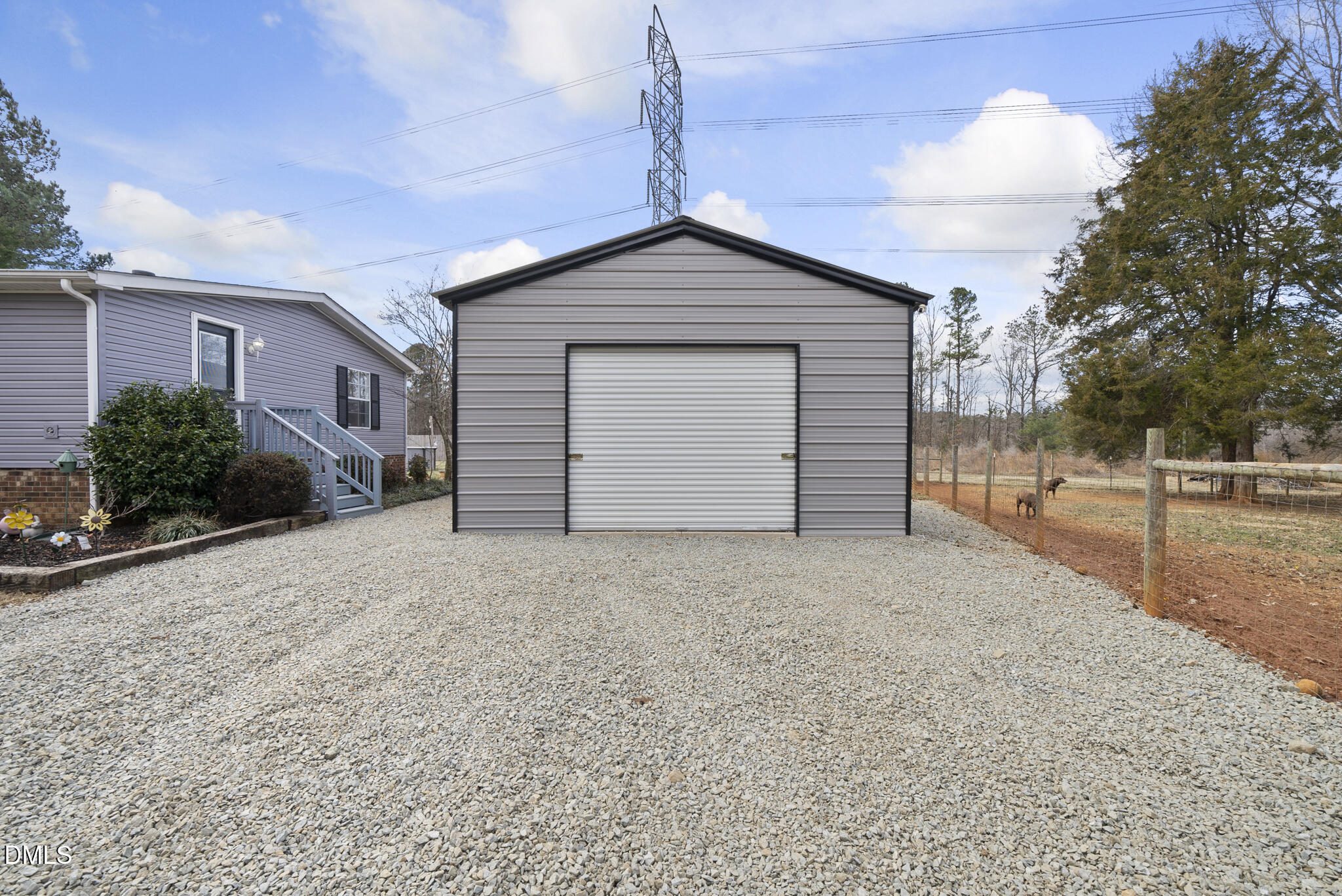 4703 Trinity Lane Rougemont, NC 27572 - Photo 48 of 55 a view of a house with a yard and garage