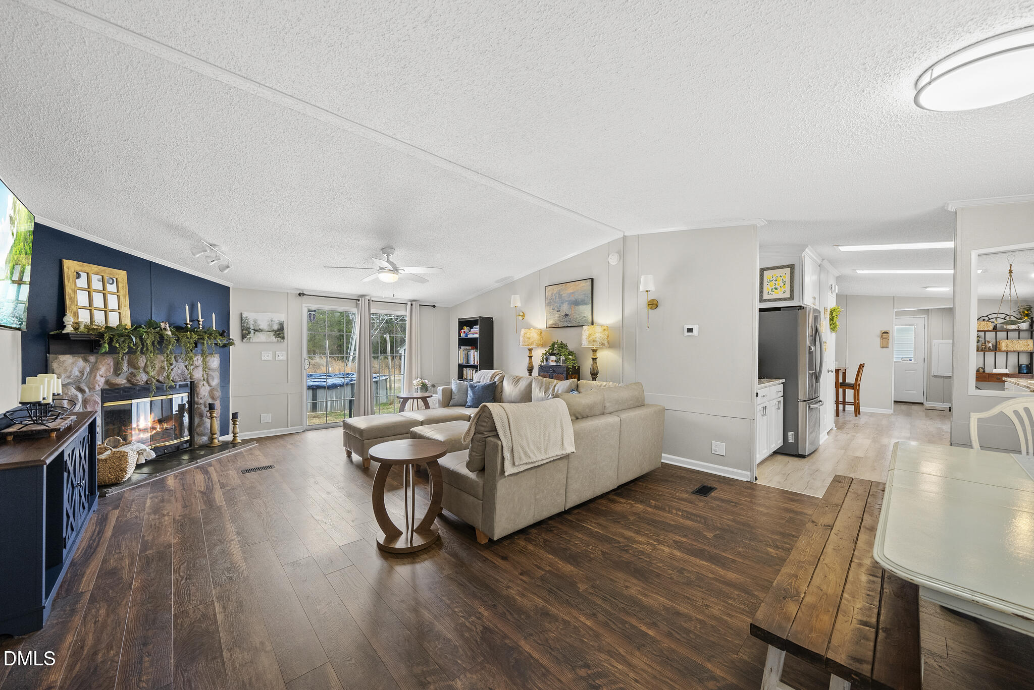 4703 Trinity Lane Rougemont, NC 27572 - Photo 4 of 55 a living room with furniture and a flat screen tv