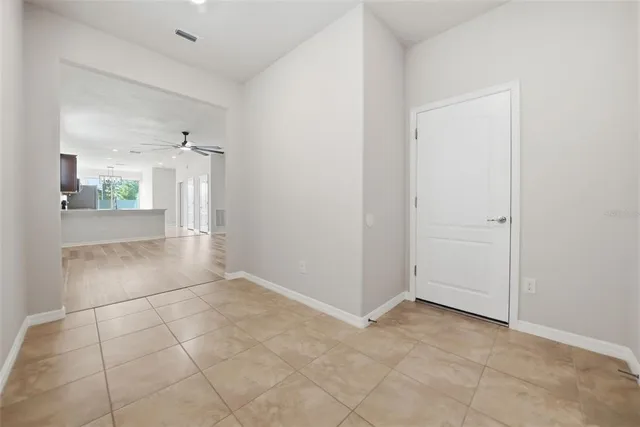 an empty room with a bathroom