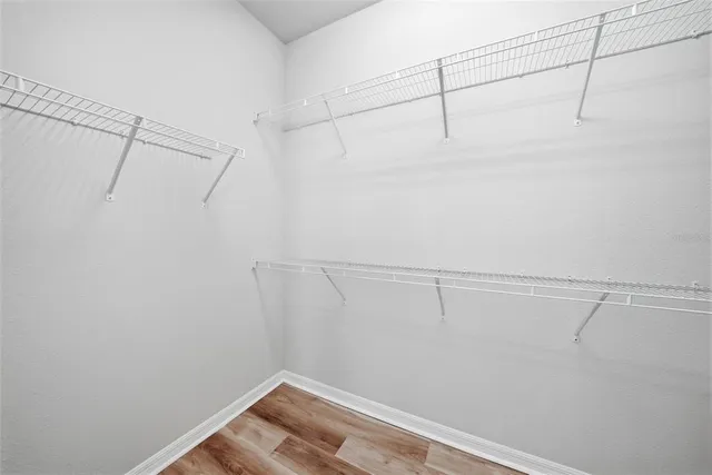 a view of a room with racks on the wall