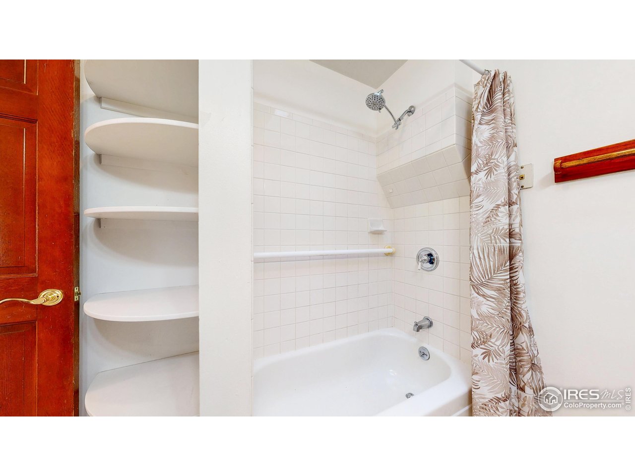 1035 West Oak Street Fort Collins, CO 80521 - Photo 24 of 50 a bathroom with a tub sink and shower