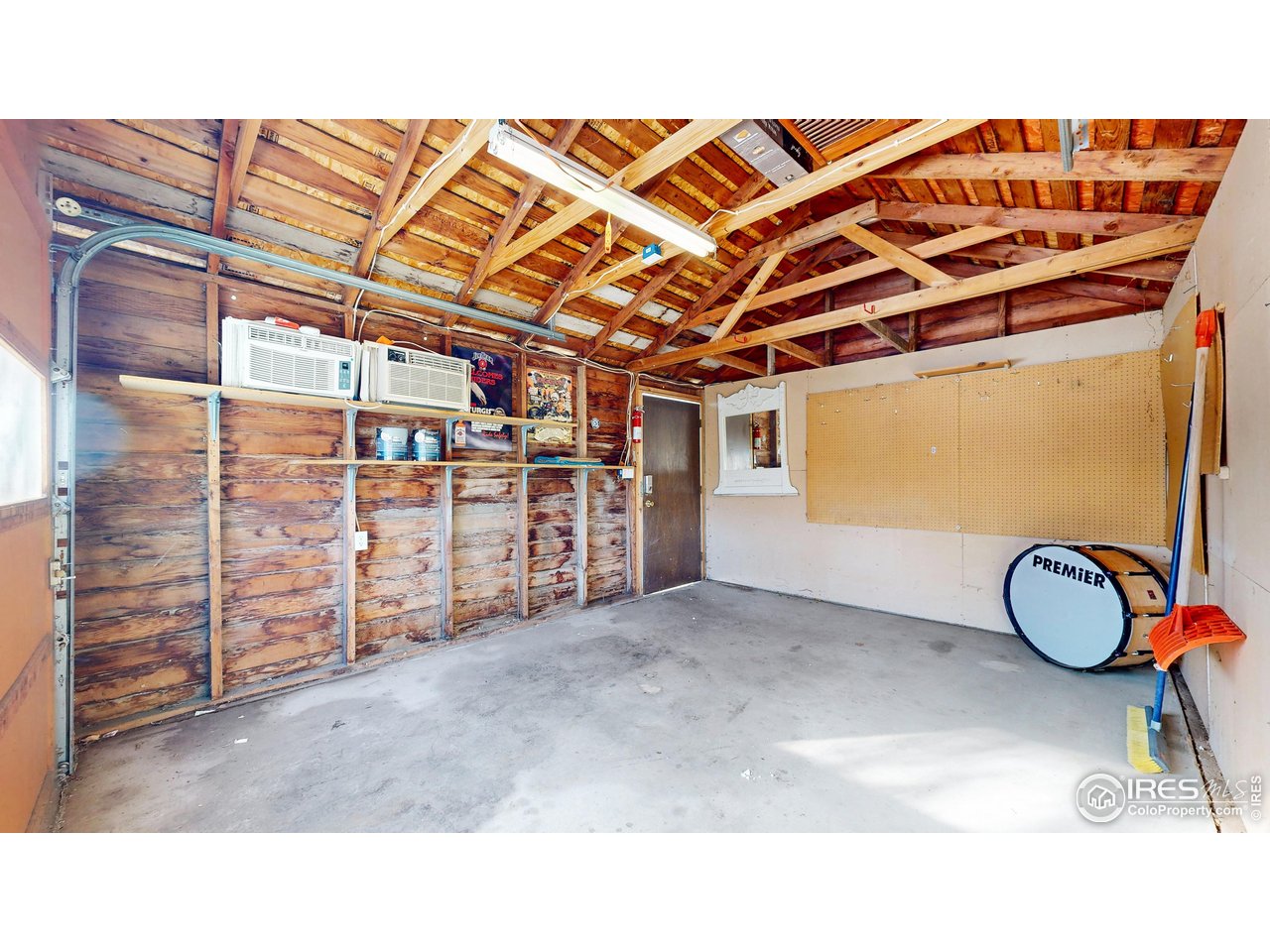 1035 West Oak Street Fort Collins, CO 80521 - Photo 27 of 50 a view of a room with wooden walls
