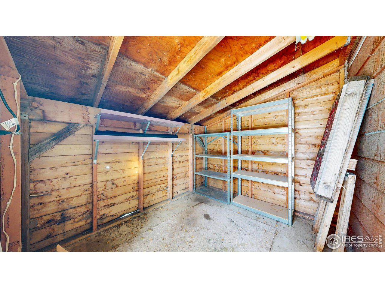 1035 West Oak Street Fort Collins, CO 80521 - Photo 28 of 50 a room with storage and utility