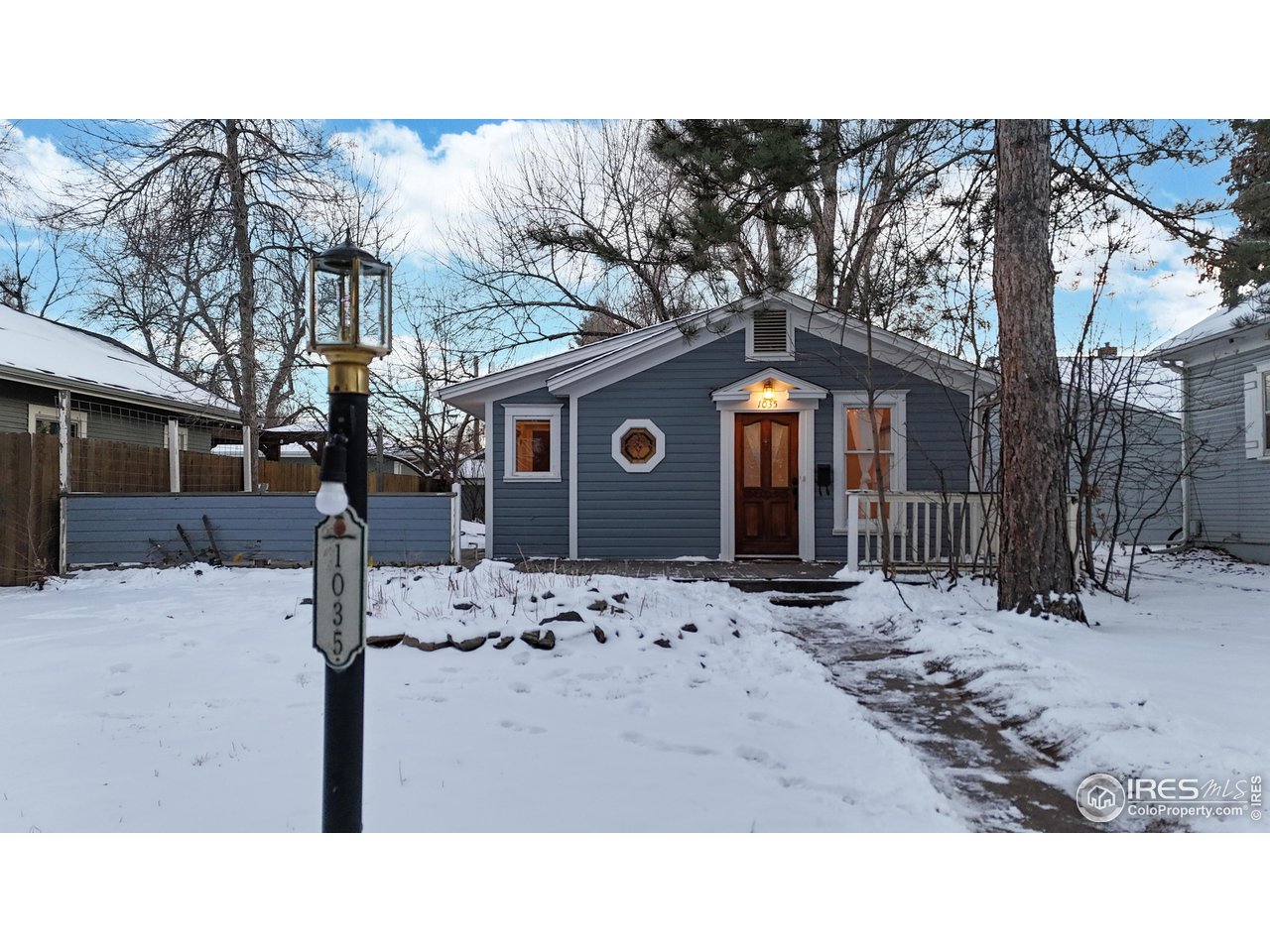 1035 West Oak Street Fort Collins, CO 80521 - Photo 3 of 50 a black and white photo of a house