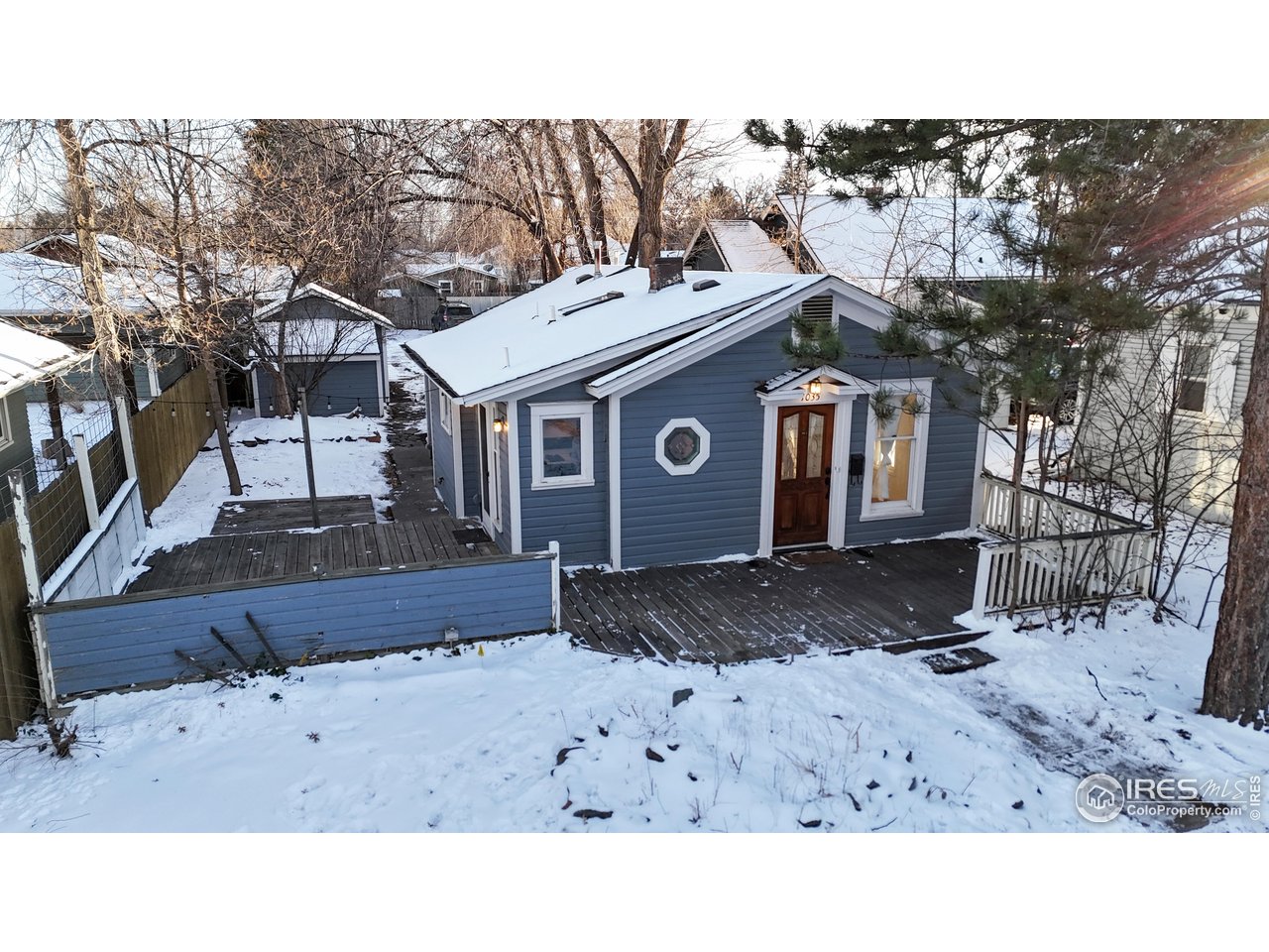 1035 West Oak Street Fort Collins, CO 80521 - Photo 35 of 50 a view of a house with a yard