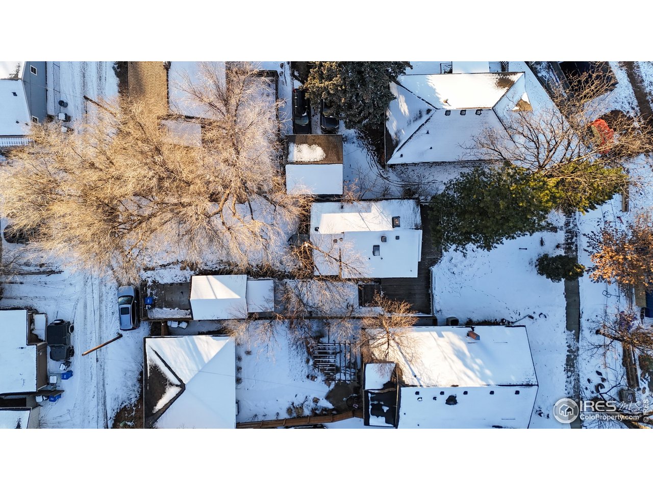 1035 West Oak Street Fort Collins, CO 80521 - Photo 42 of 50 an aerial view of multiple houses with yard