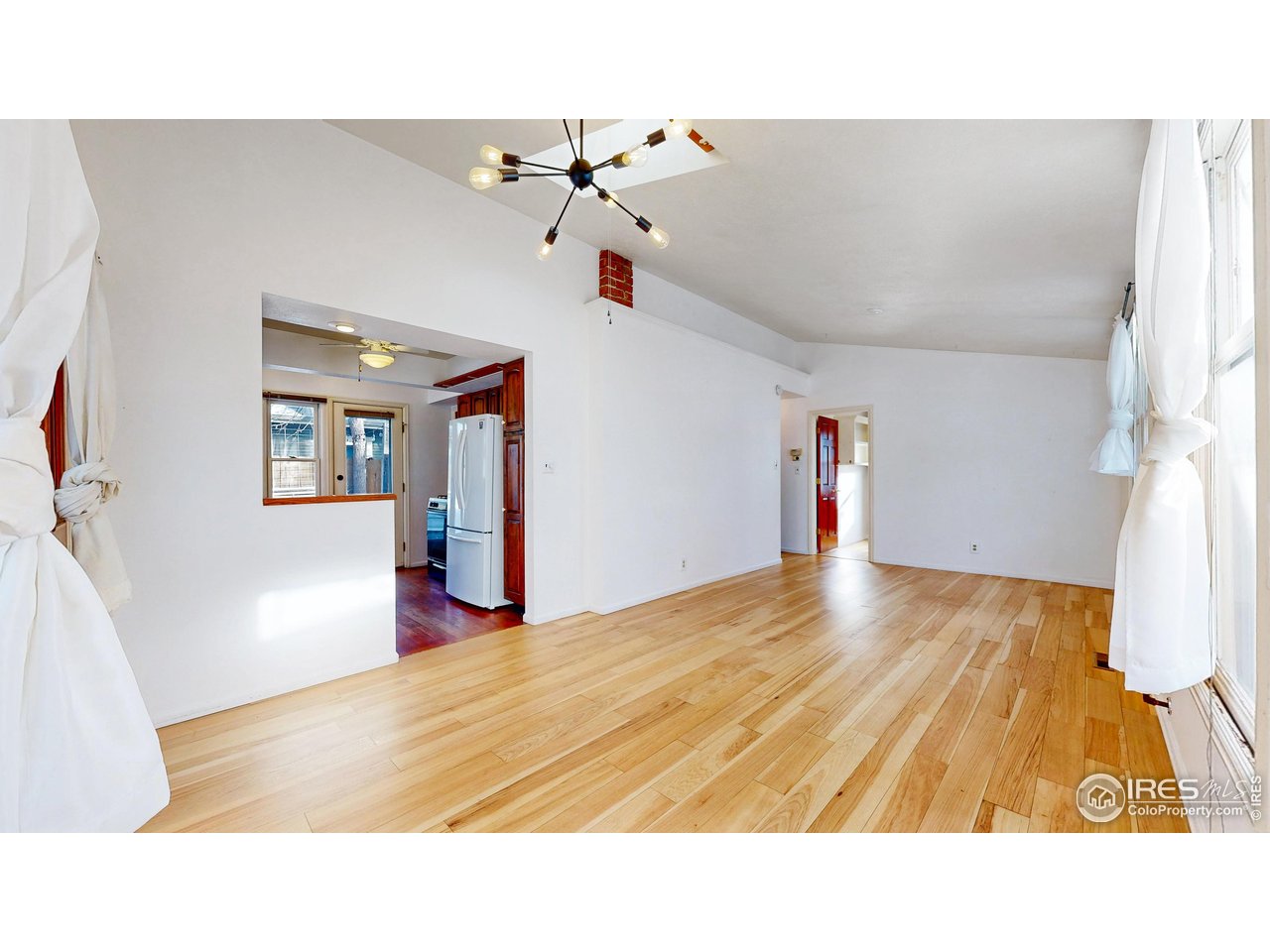 1035 West Oak Street Fort Collins, CO 80521 - Photo 6 of 50 a bathroom with a sink and a mirror