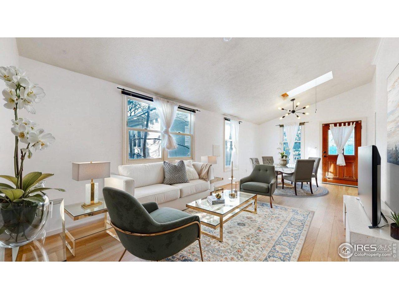1035 West Oak Street Fort Collins, CO 80521 - Photo 10 of 50 a living room with furniture and window