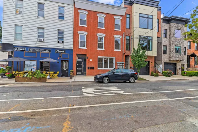 a building on the side of a street