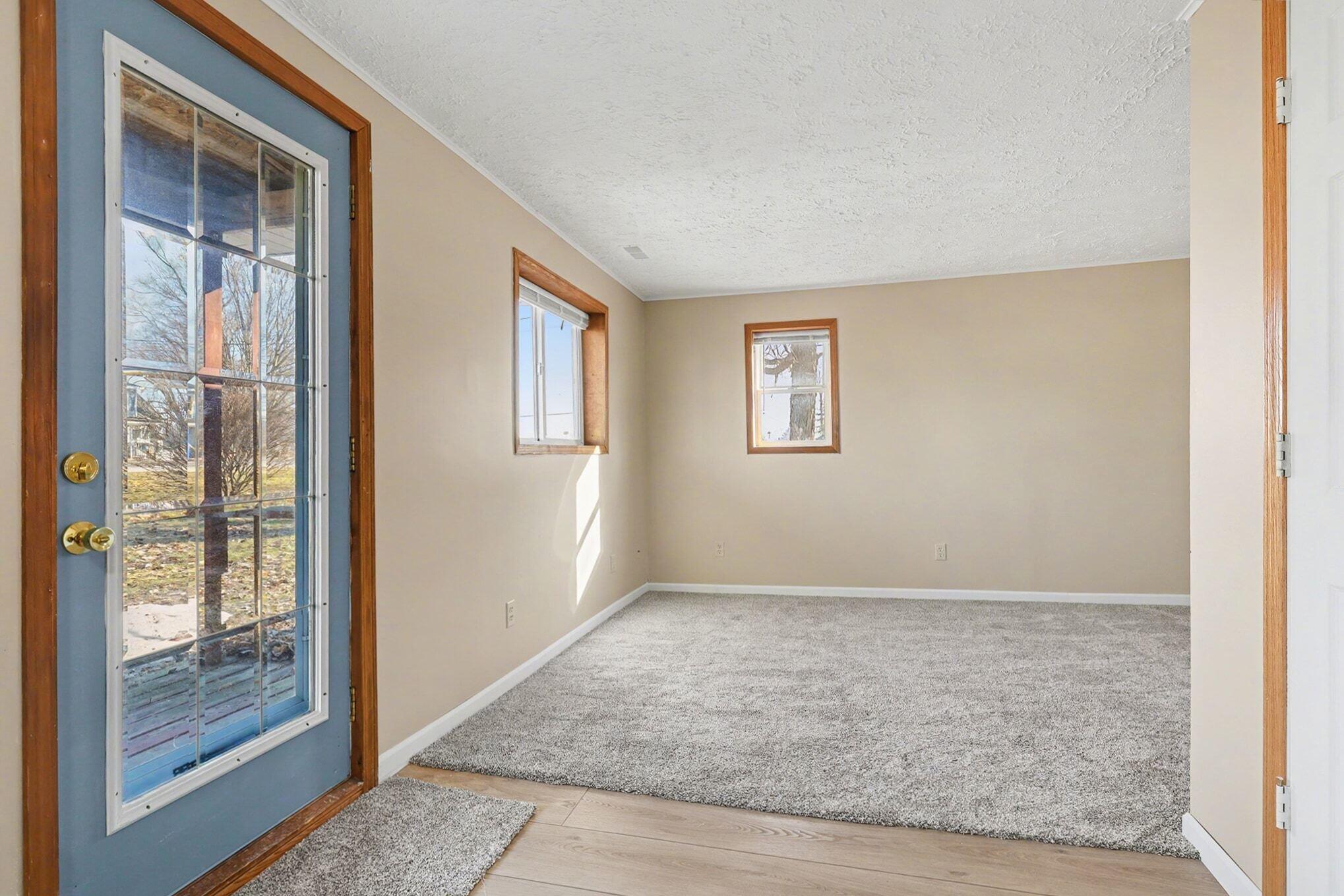 9558 Belding Road Northeast Rockford, MI 49341 - Photo 5 of 27 005_file_5451