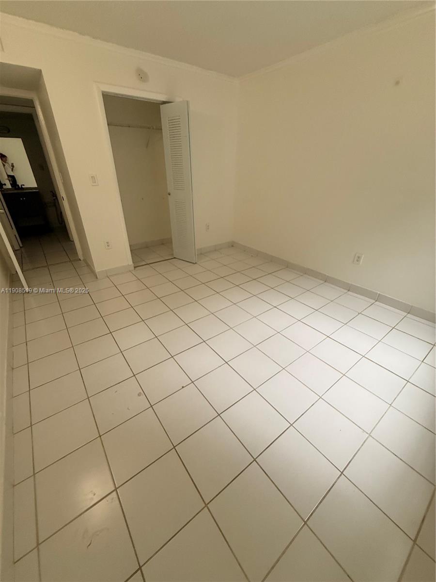 6300 Southwest 138th Court, Unit 102 Miami, FL 33183 - Photo 9 of 17 a view of a garage