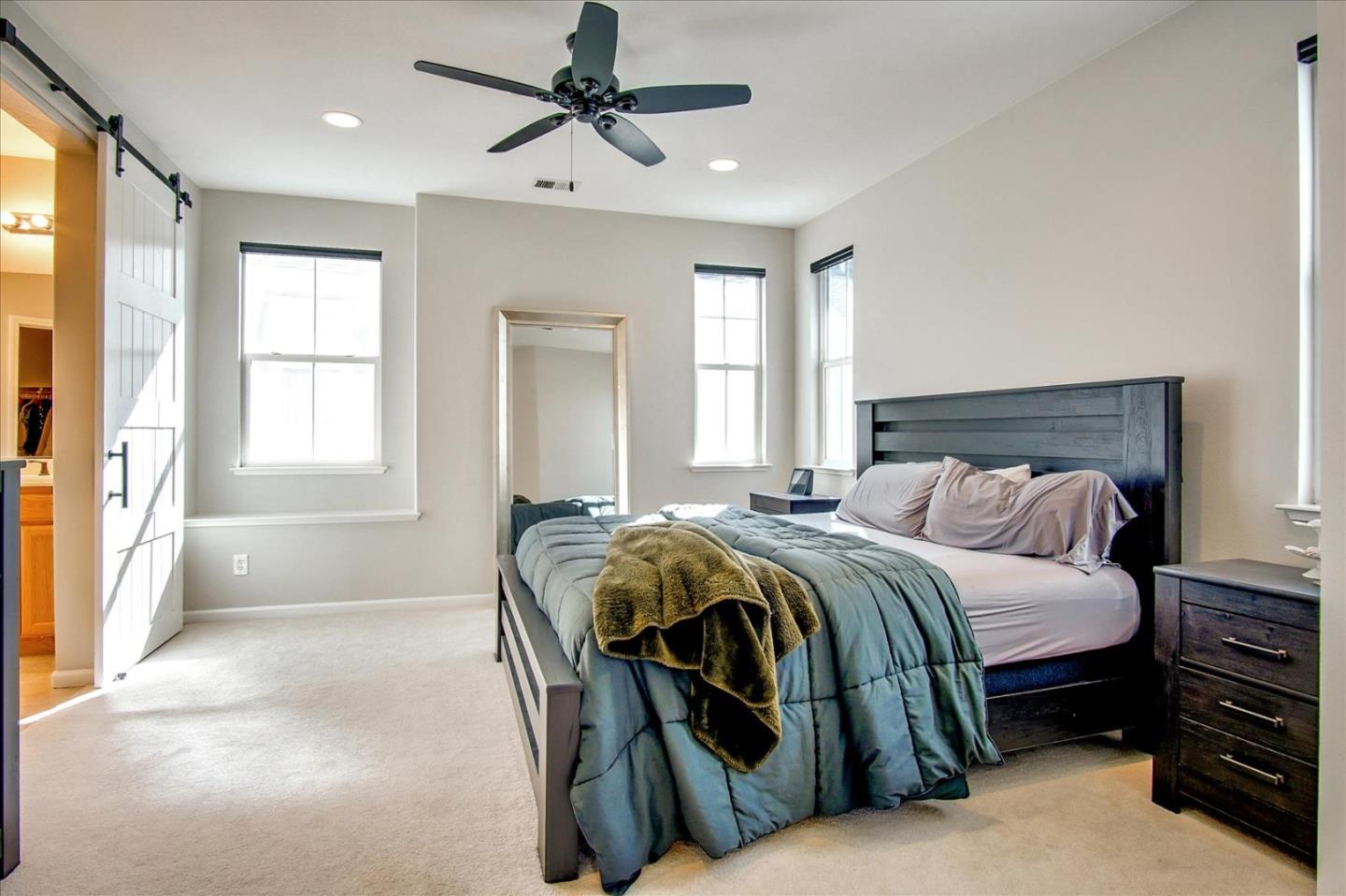 758 Tennyson Drive Gilroy, CA 95020 - Photo 23 of 39 a bedroom with a large bed and a window