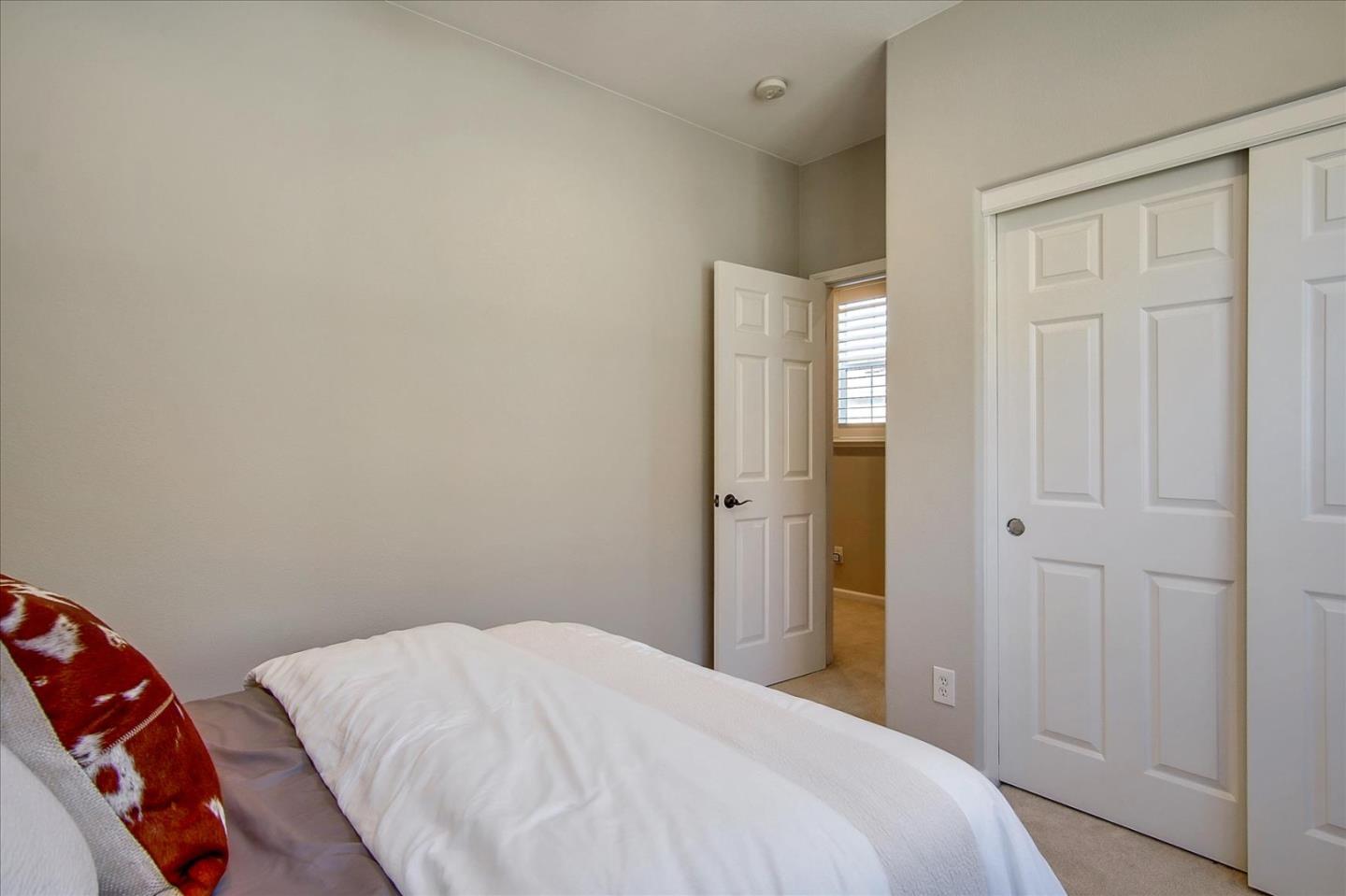 758 Tennyson Drive Gilroy, CA 95020 - Photo 25 of 39 a bedroom with a bed and a closet