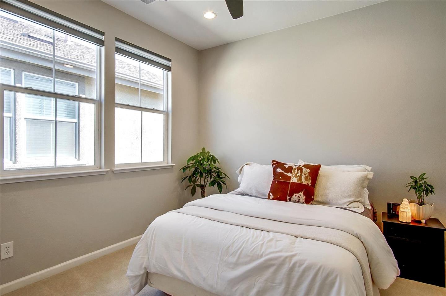 758 Tennyson Drive Gilroy, CA 95020 - Photo 26 of 39 a bedroom with a bed and a window