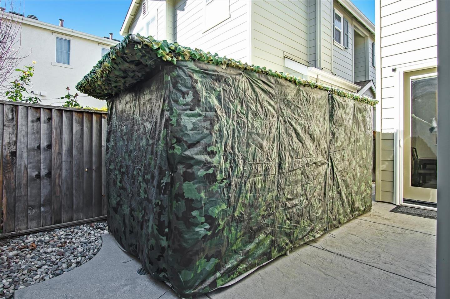 758 Tennyson Drive Gilroy, CA 95020 - Photo 35 of 39 a view of a wooden door with a wooden fence