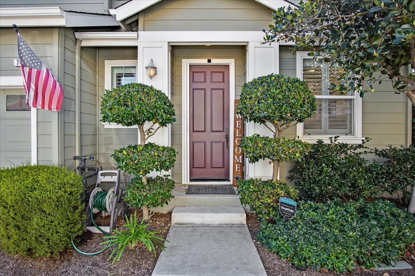 758 Tennyson Drive Gilroy, CA 95020 - Photo 4 of 39 front view of a house with potted plants