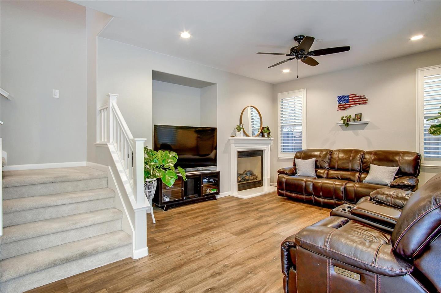 758 Tennyson Drive Gilroy, CA 95020 - Photo 6 of 39 a living room with furniture and a fireplace
