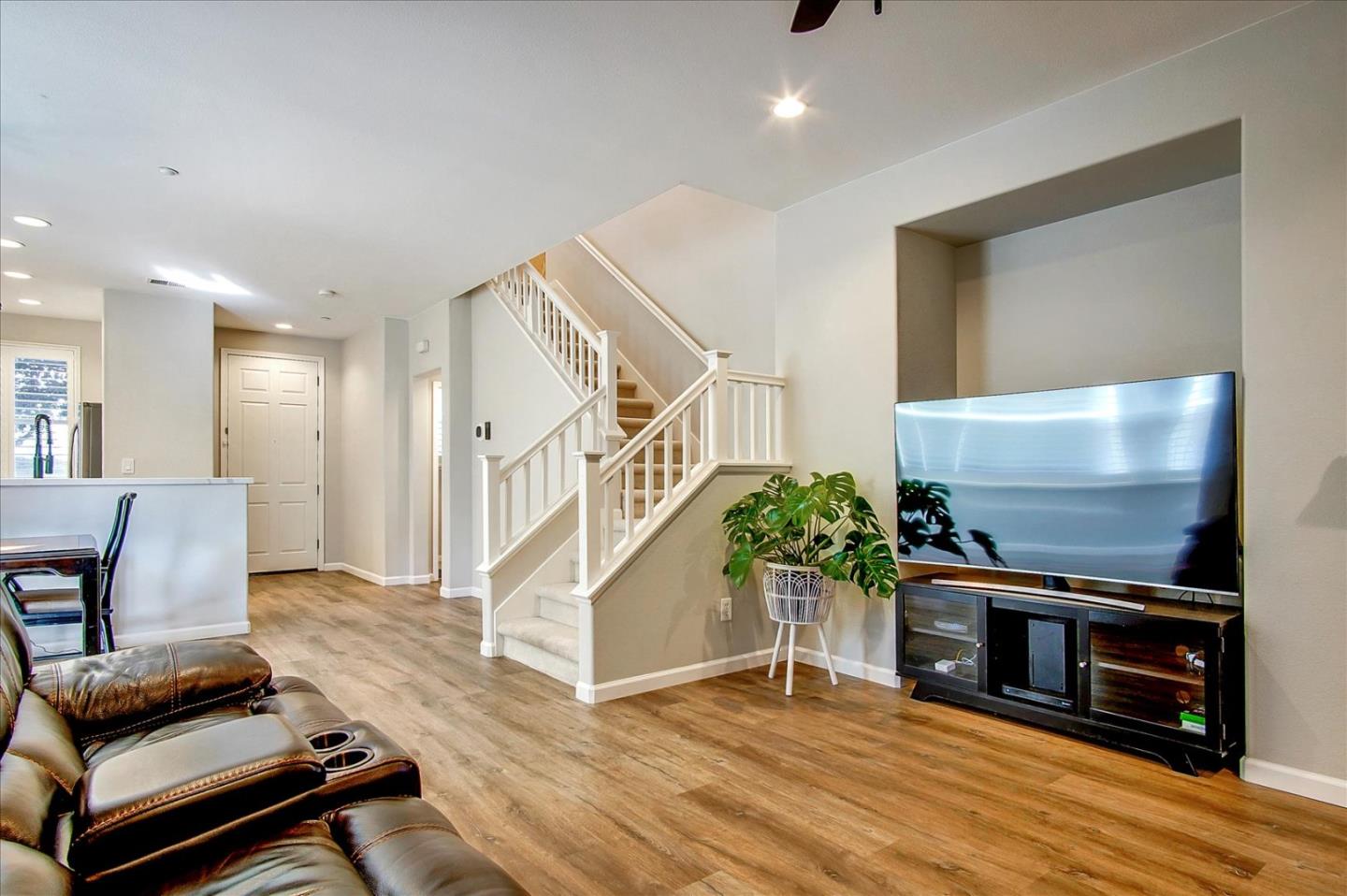 758 Tennyson Drive Gilroy, CA 95020 - Photo 9 of 39 a living room with furniture and a wooden floor