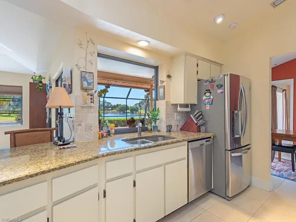 $695,000 | 105 Cherry Hill Court, Naples, FL 34113