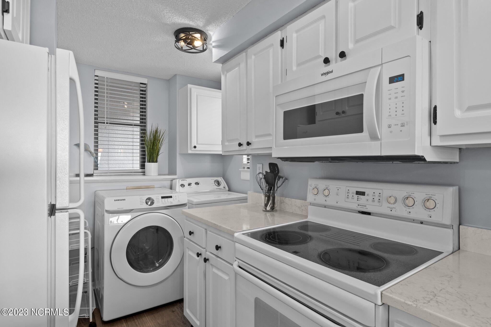 1505 Salter Path Road, Unit 442 Indian Beach, NC 28512 - Photo 18 of 77 Laundry/Kitchen