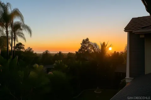 a view of a yard from a balcony