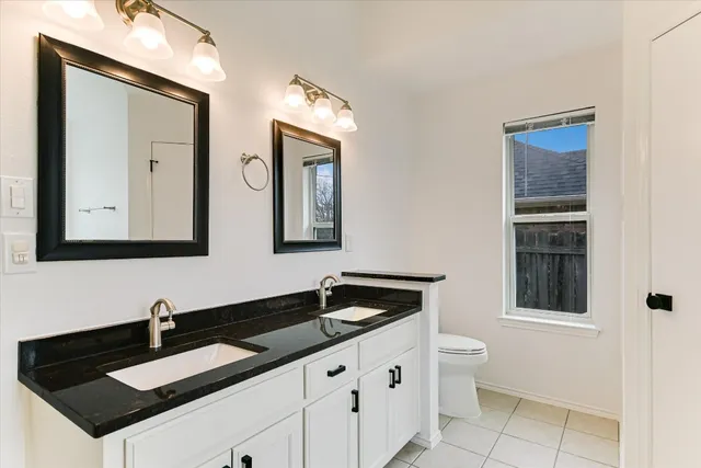 a view of an empty room with a large window