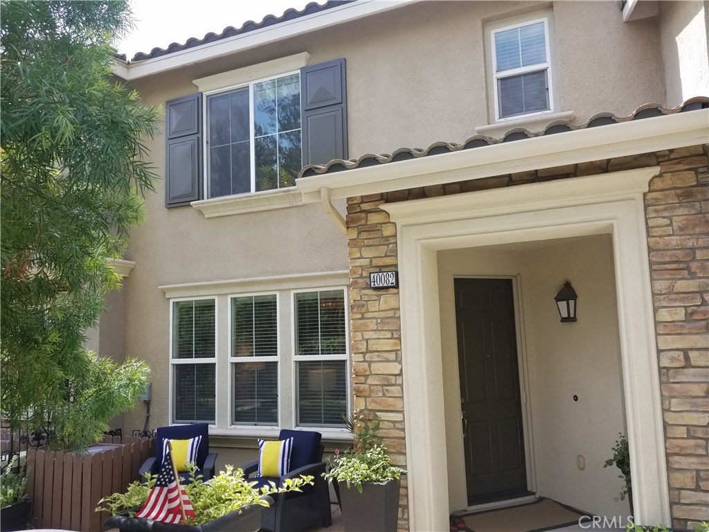40082 Spring Pl Court Temecula, CA 92591 - Photo 1 of 1 a front view of a house with an outdoor space