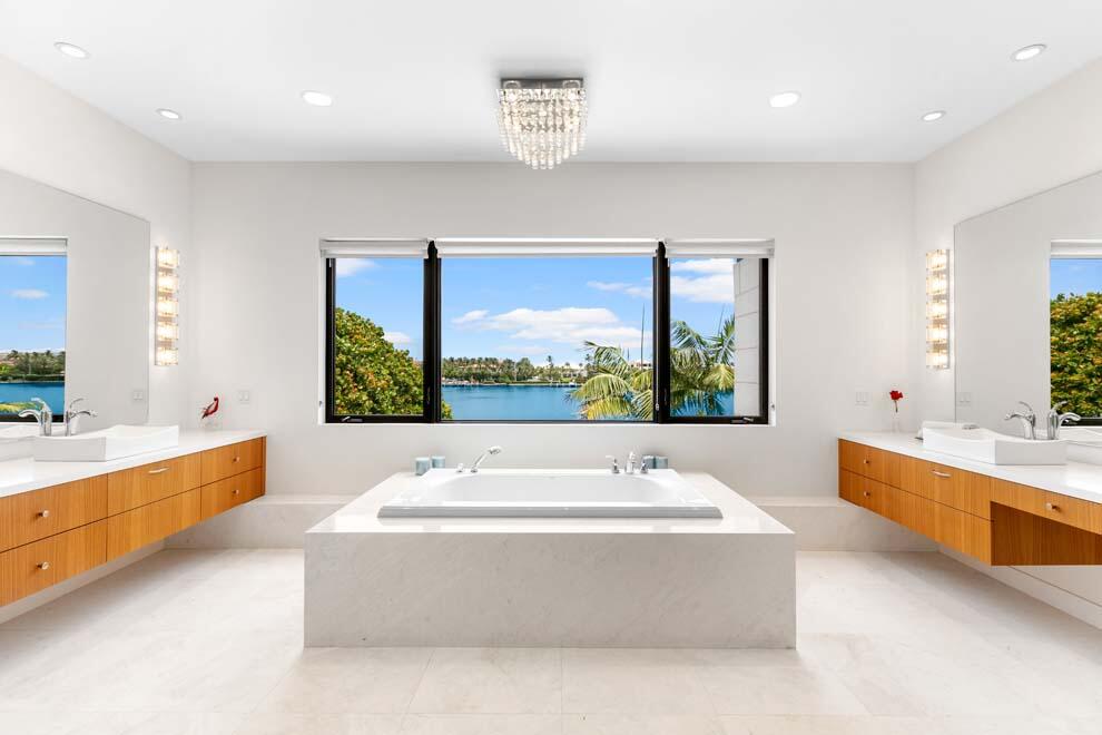 1540 Paslay Place Manalapan, FL 33462 - Photo 16 of 40 a large white kitchen with a large window